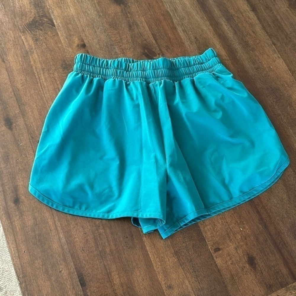 Beyond yoga, teal athletic shorts size small